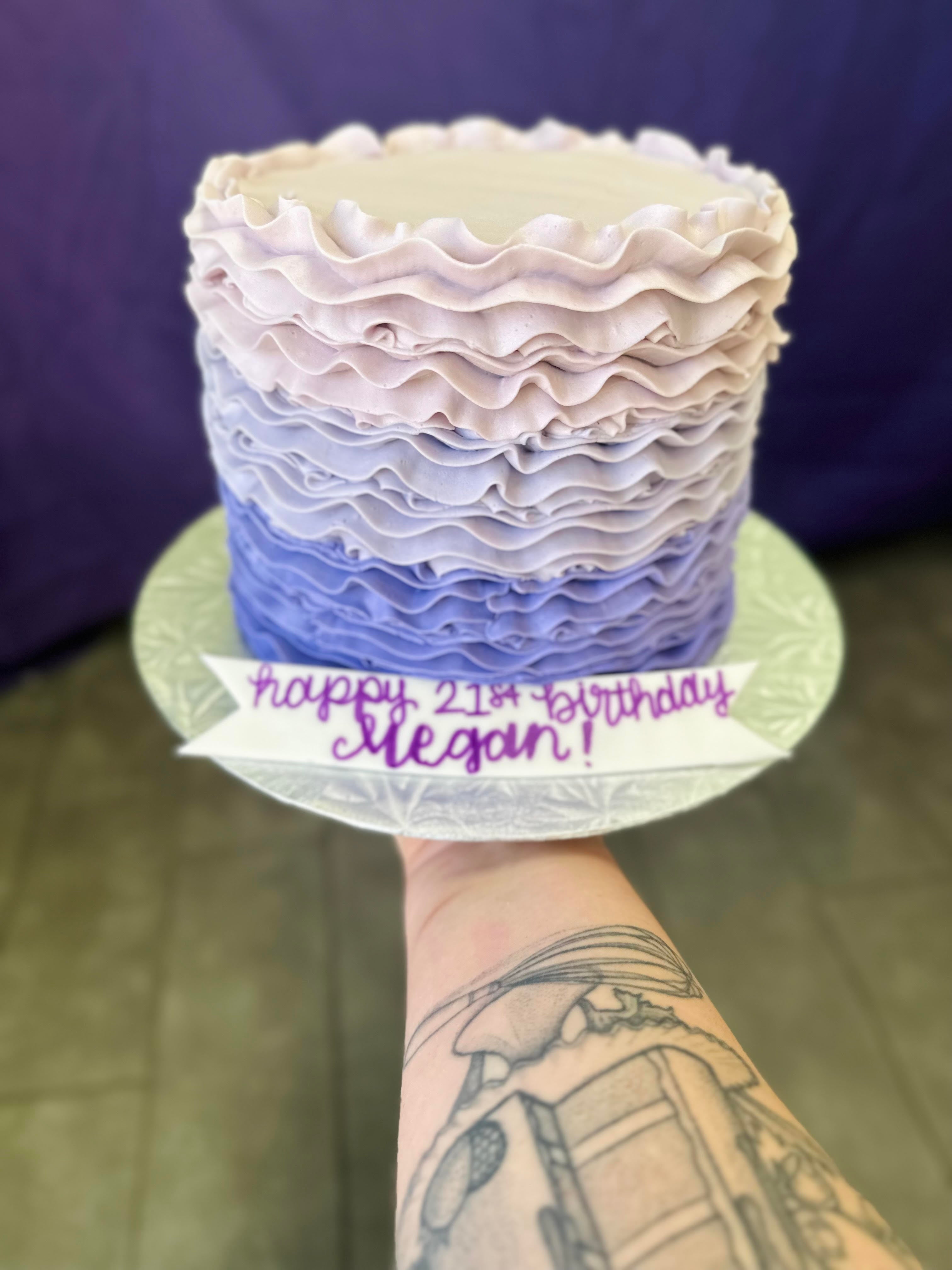 Ombre ruffle cake in shades of blue - SuperStock